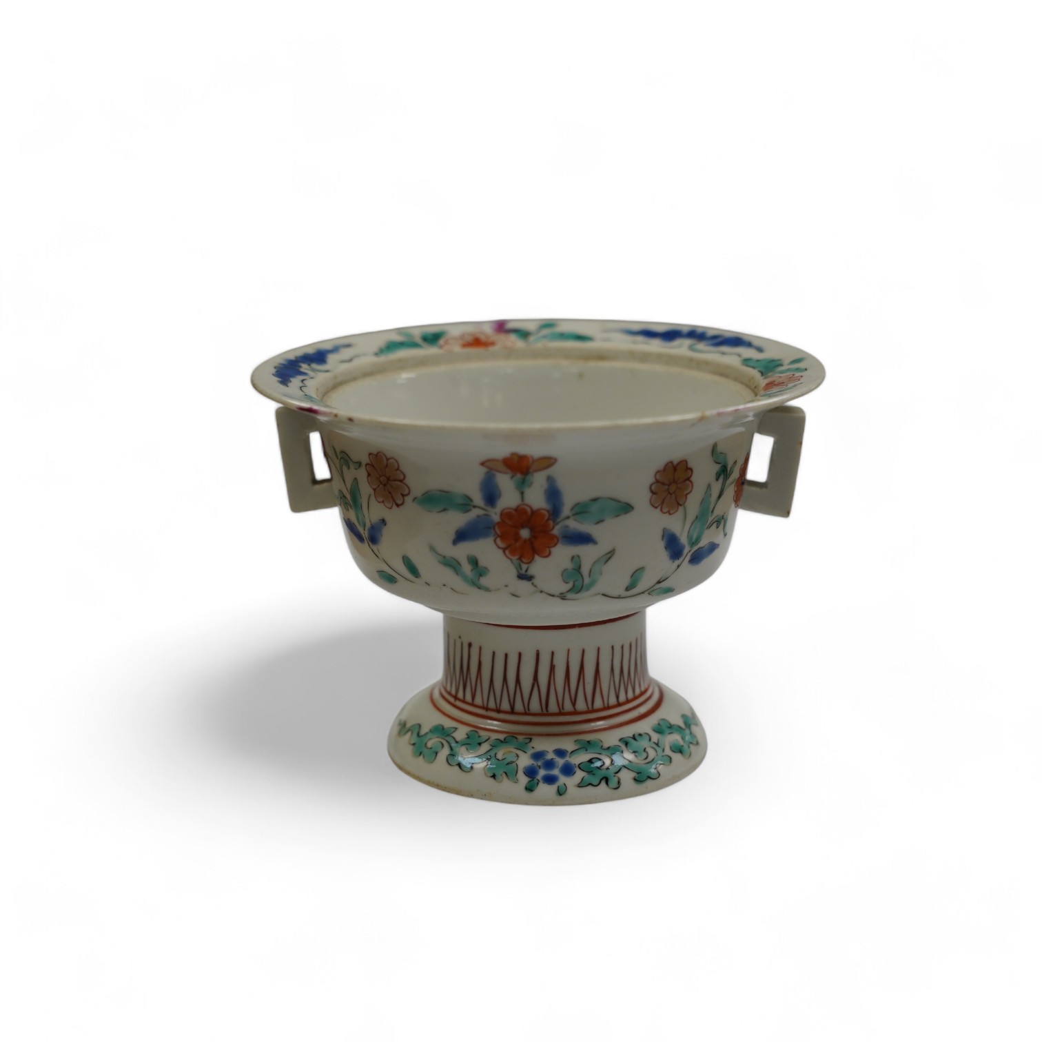 A Japanese Kakiemon stem bowl, lacking cover, late 17th century, 9cm. Condition - poor to fair